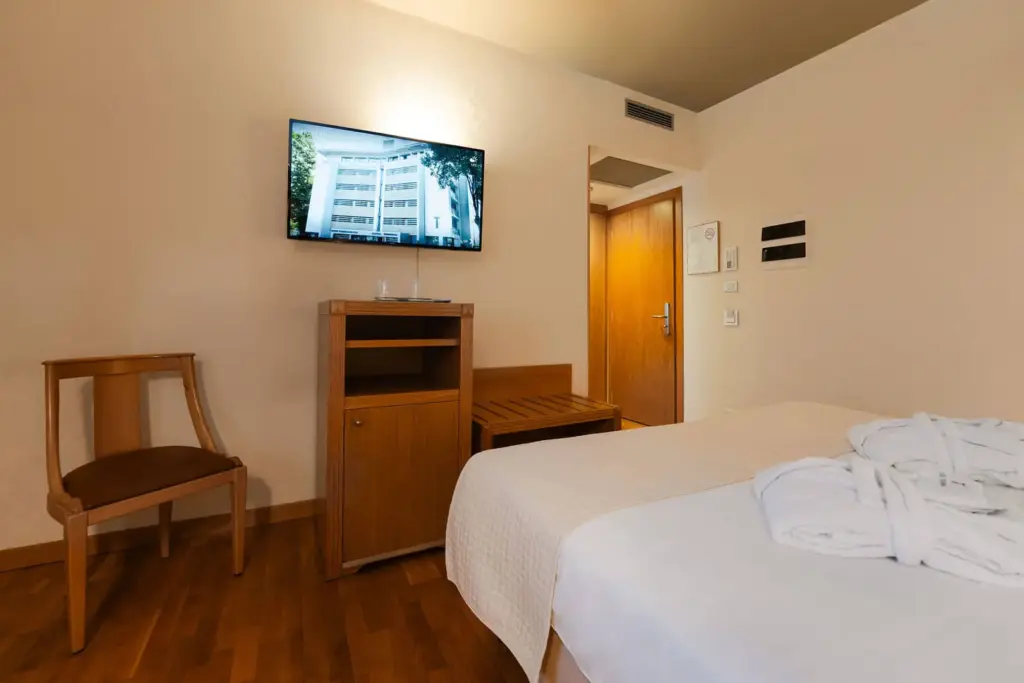 Camera elegante e accogliente in hotel storico