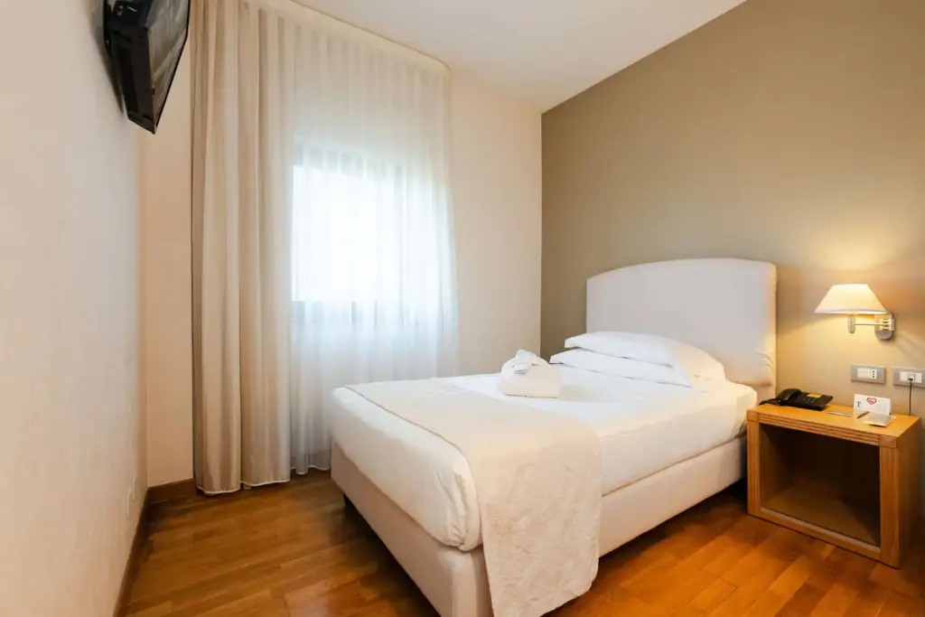 Accogliente camera singola all'Hotel Touring
